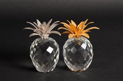 Lot 516 - Two Swarovski Crystal paperweight models of pineapples