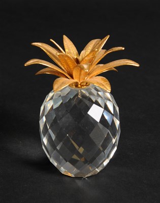 Lot 516 - Two Swarovski Crystal paperweight models of pineapples