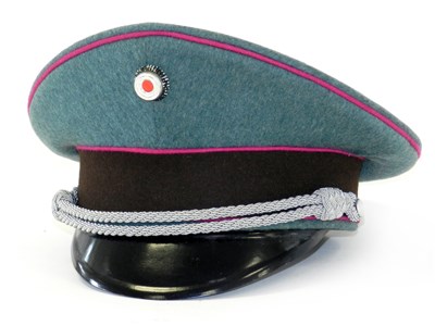 Lot 642 - German Third Reich Schutzpolizei visor cap and a Bundeswehr visor cap
