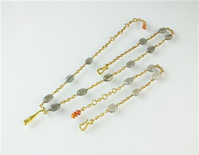 Lot 329 - A grey moonstone and diamond necklace and bracelet suite