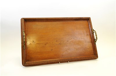 Lot 716 - A Victorian oak three decanter tantalus with silver-plated mounts and an oak drinks tray