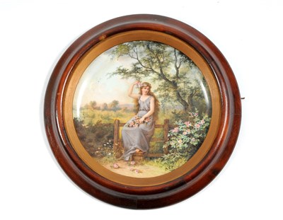 Lot 493 - A late 19th century circular porcelain plaque