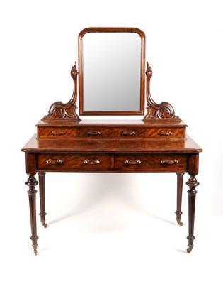 Lot 615 - A Victorian flame mahogany veneered dressing table