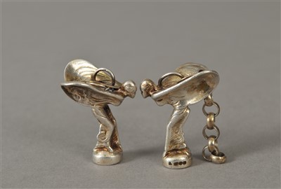 Lot 23 - A pair of miniature silver 'Spirit of Ecstasy' models