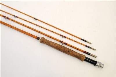 Lot 242 - A 20th century Hardy three-sectional split cane fishing rod