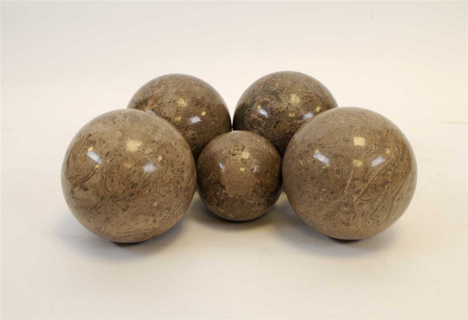 Lot 541 - Five decorative polished grey serpentine marble balls