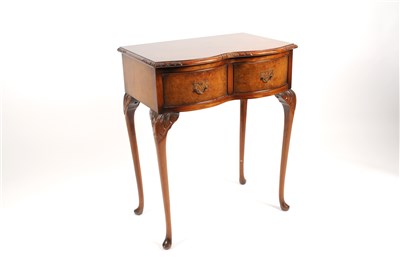 Lot 680 - A small serpentine-fronted Queen Anne style side table