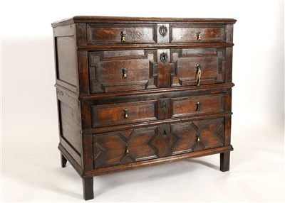 Lot 630 - An 18th century oak chest of four drawers in the Jacobean style