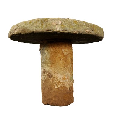 Lot 605 - An old weathered natural staddle stone