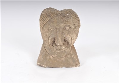 Lot 541 - A weathered carved limestone bust