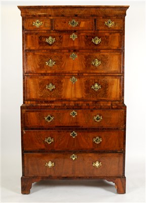 Lot 681 - A George III cross-banded walnut chest on chest