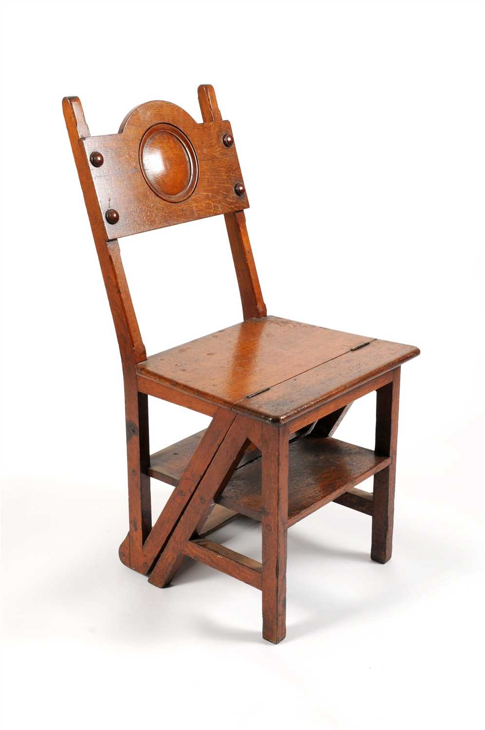 Lot 636 - A late 19th century oak folding hall chair / flight of library steps