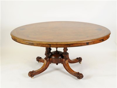 Lot 666 - A decorative Victorian walnut veneered breakfast table