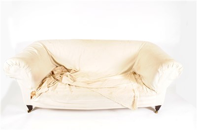 Lot 640 - An Edwardian upholstered Chesterfield sofa, for restoration