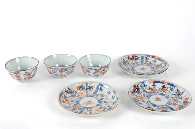 Lot 227 - Three 18th century Chinese porcelain tea bowls and saucers in the (Chinese) Imari palette