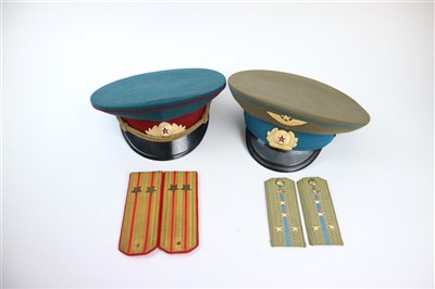 Lot 430 - Two Soviet Russian caps and two pairs of Soviet Russian shoulder boards