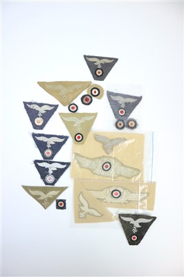 Lot 438 - A group of Luftwaffe cloth M43/Field Cap...