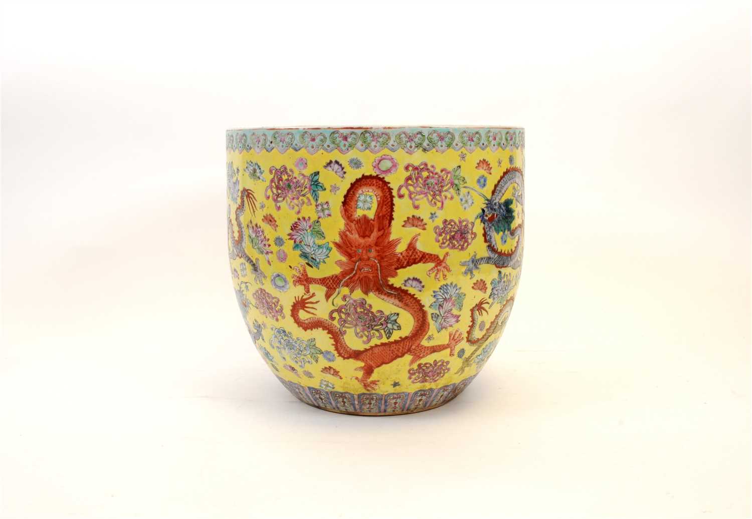 Lot 532 - A Chinese porcelain nine dragon jardinière in...