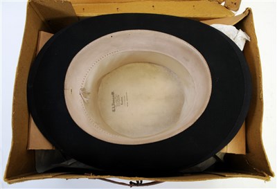 Lot 581 - A boxed Dunn & Co top hat