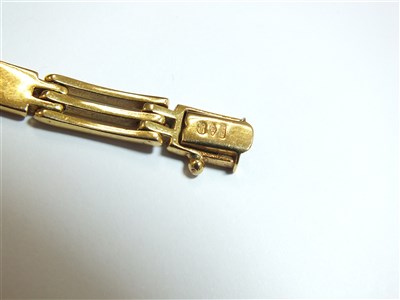 Lot 304 - Two yellow metal bracelets
