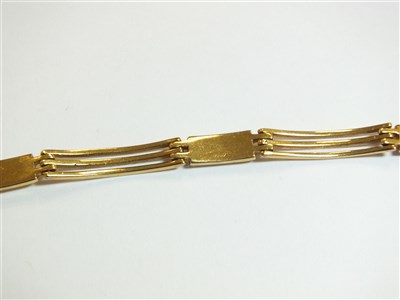 Lot 304 - Two yellow metal bracelets
