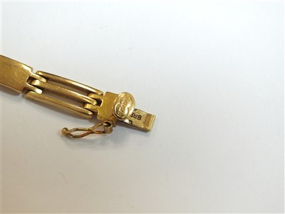 Lot 304 - Two yellow metal bracelets