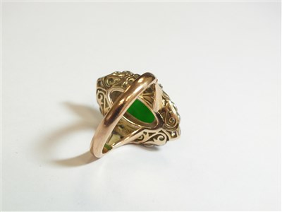 Lot 307 - A jade and diamond cluster ring