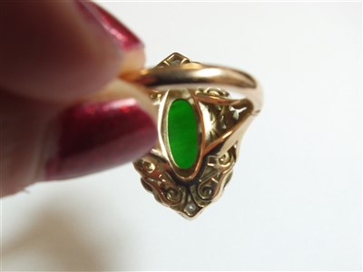Lot 307 - A jade and diamond cluster ring