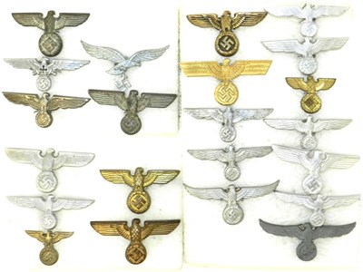 Lot 298 - A collection of 22 Third Reich National emblem badges