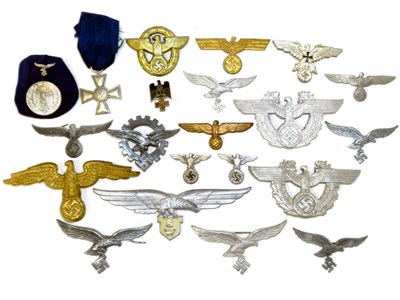 Lot 297 - A collection of 20 Third Reich Cap Badges