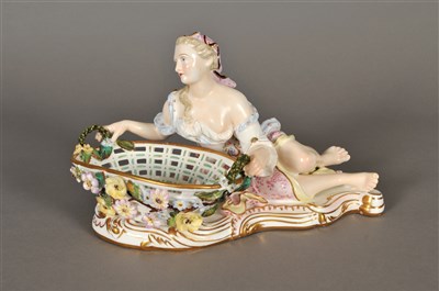 Lot 201 - A Continental porcelain figural sweetmeat dish