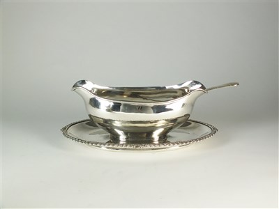 Lot 198 - An Egyptian silver sauce boat on stand