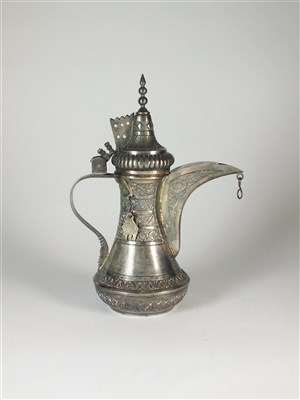 Lot 219 - An Islamic white metal coffee pot