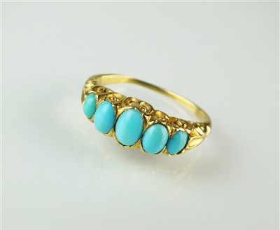 Lot 252 - A five stone turquoise ring