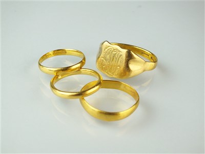 Lot 269 - Four 22ct gold rings