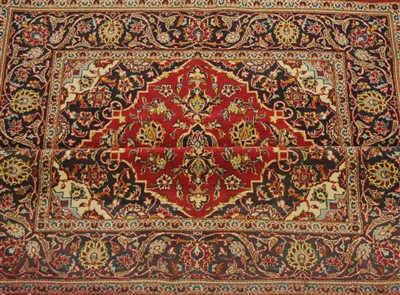 Lot 829 - A Kashan rug, Central Iran, the crimson field...