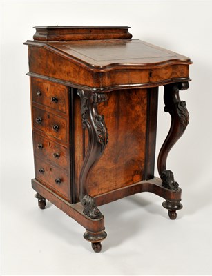 Lot 260 - A Victorian figured walnut davenport with lift...