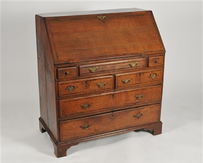 Lot 364 - A George III country oak bureau