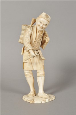 Lot 114 - A Meiji period Japanese ivory okimono