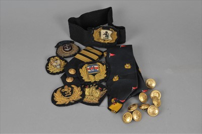 Lot 190 - A small collection of naval fabric and gold...