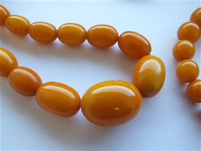 Lot 339 - Two amber bead necklaces
