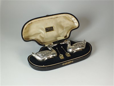 Lot 227 - A cased pair of Edwardian novelty silver duck salts