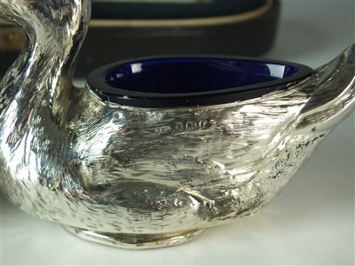 Lot 227 - A cased pair of Edwardian novelty silver duck salts