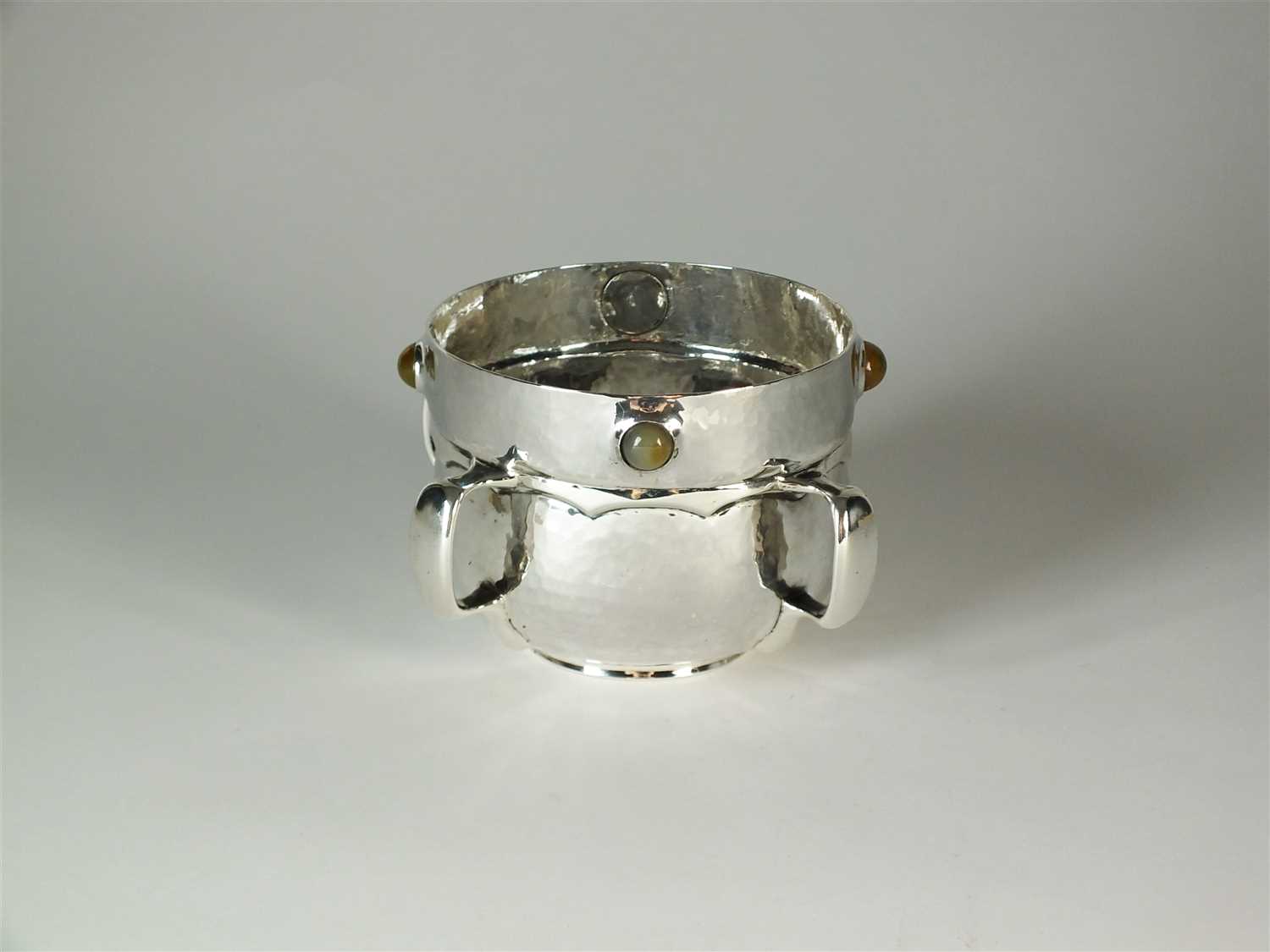 Lot 234 - A Liberty & Co Cymric silver four handled bowl