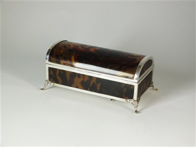 Lot 220 - A silver mounted tortoiseshell musical trinket box