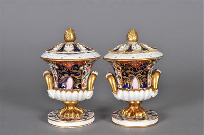Lot 133 - A pair of Derby pot pourri vases and covers