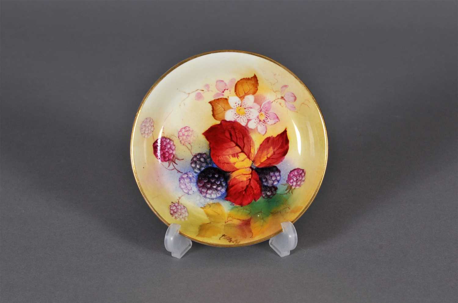 Lot 128 - A Royal Worcester fruit-decorated pin dish