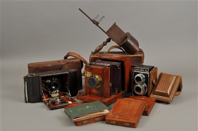 Lot 314 - An Edwardian cased mahogany plate camera and a stereoscopic viewer and other cameras