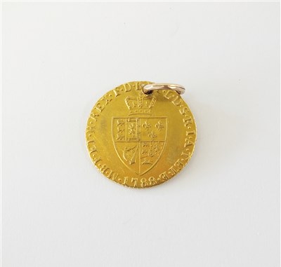 Lot 391 - A George III half spade guinea