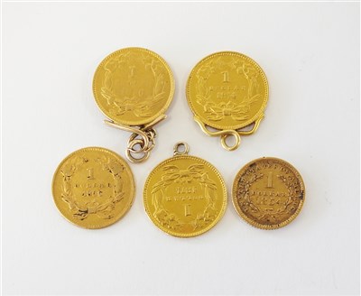 Lot 393 - A collection of five gold USA coins